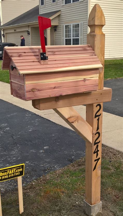 wooden house mailbox